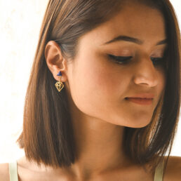silver earrings in gold finish with lapis lazuli for protection